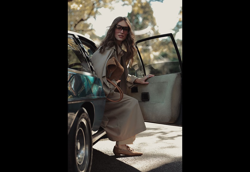 Image of a woman coming out of a car taken by Steven Chee
